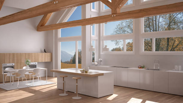 istock Modern kitchen in classic villa, loft, big panoramic windows on autumn meadow, white minimalist interior design 883969616