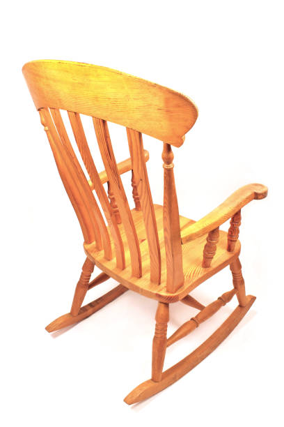 istock Wooden rocking chair isolated on white 883978658
