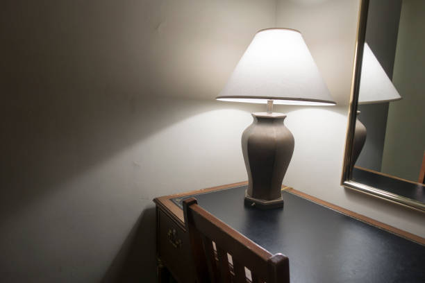 istock classic lamp on desk white bulb lighted 883982856
