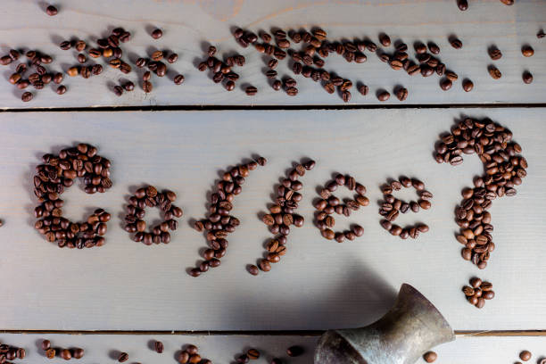Coffee Inscription. Word Coffee on The Table near Cup. Flat Lay