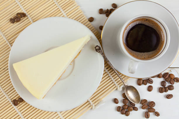 istock classic cheesecake on white plate on  wooden table 884007586