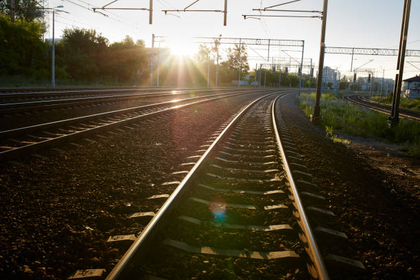 istock Railroad in the suburbs. Sunrise 884011260