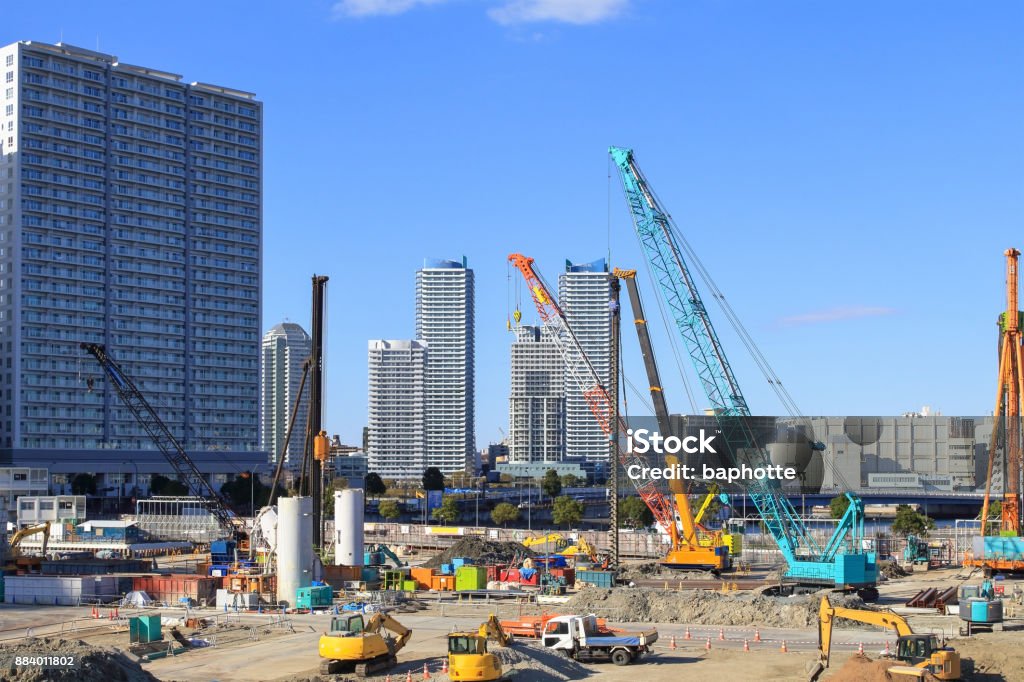 Construction site Landscape with excavator cars and crane cars Construction Site Stock Photo