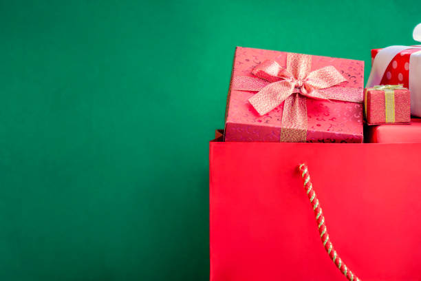 istock top view gift boxes in bag and shopping mall 884012394