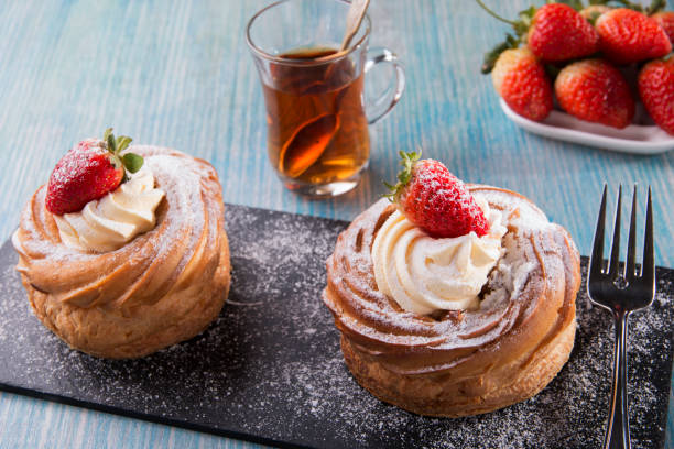 istock cake with custard and strawberries whipped cream 884019280