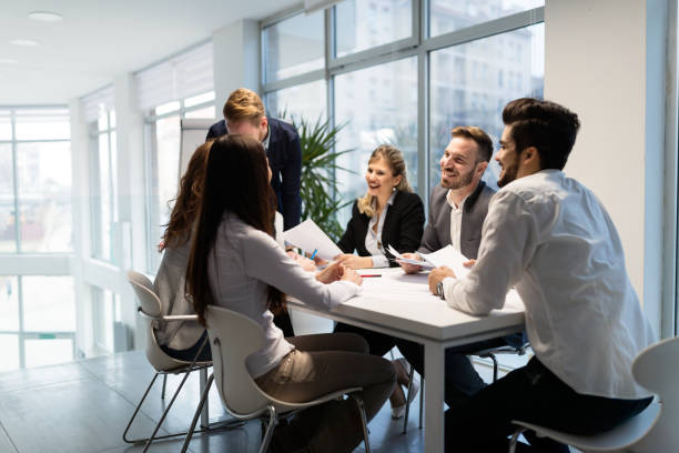 istock Team of architects working together on project 884025972