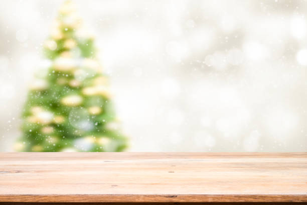 istock Wood table top on white bokeh abstract background 884033904
