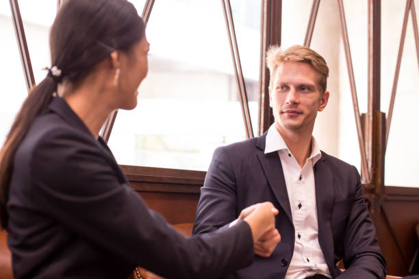 istock Man shaking hands for Business at restaurant, Man working concept. 884038144