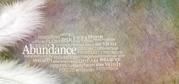 Angelic Abundance Word Cloud Two white feathers and an ABUNDANCE word cloud against a rustic subtle colored stone effect background with copy space abundance stock pictures, royalty-free photos & images