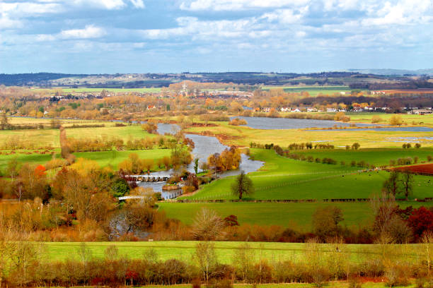 A view from the Wittenham Clumps of Days Lock and Dorchester, Berkshire, England, United Kingdom. A view of stereotypical English countryside with a Lock on the River Thames at Little Wittenham. dorchester on thames stock pictures, royalty-free photos & images