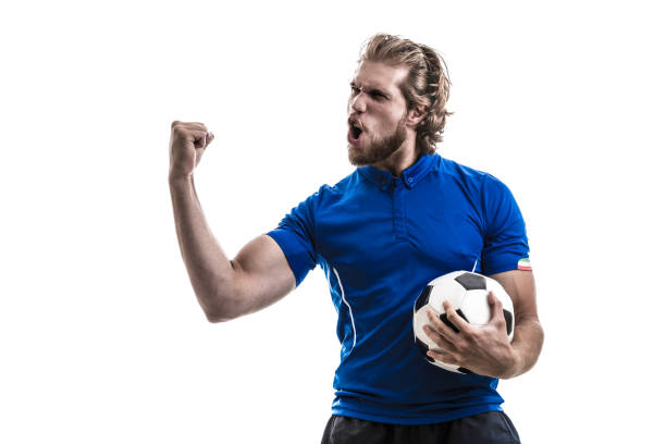istock Male athlete / fan in blue uniform celebrating on white background 884041854
