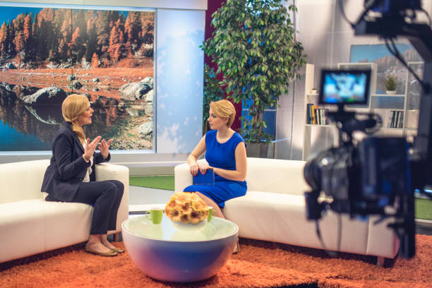 istock Filming TV talk show 884051556