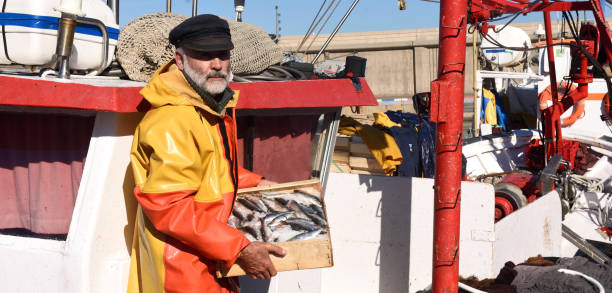 fisherman - fishing nautical vessel small men imagens e fotografias de stock