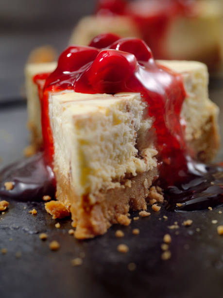 istock Chocolate Swirl Cheesecake with Cherry Topping 884055020