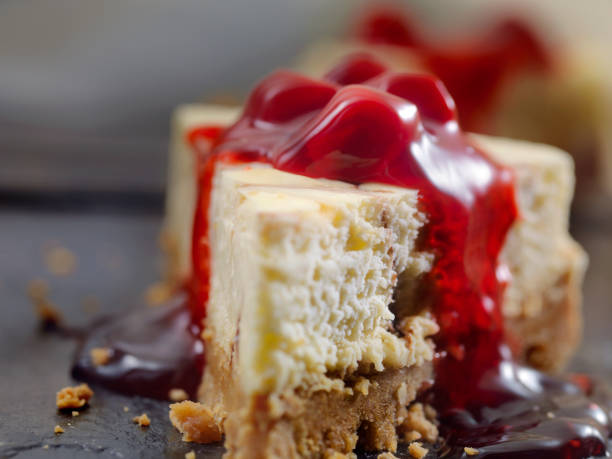istock Chocolate Swirl Cheesecake with Cherry Topping 884055218