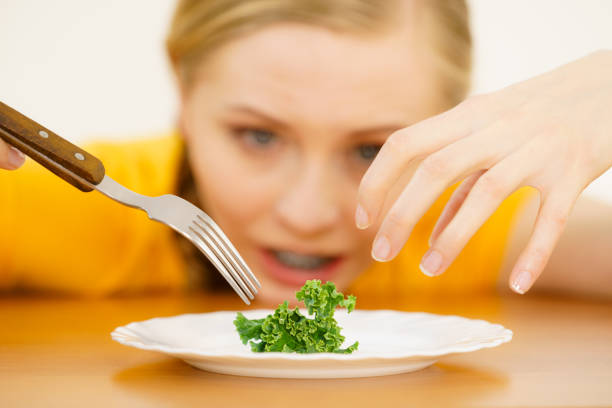 istock Sad young woman being on diet 884055802