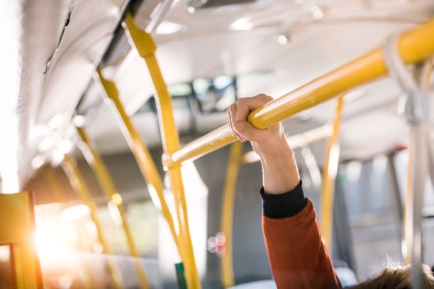 istock person standing in bus 884065378