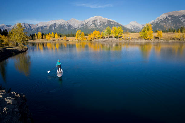 istock Stand Up Paddleboard Girl 884069856