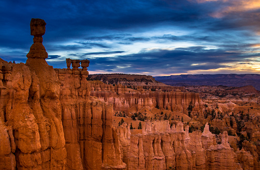 Early morning sunlight touching the towering rock hoodoos and dramatic formations of Bryce Canyon National Park, Utah.