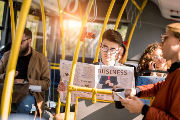 istock young businessman in bus 884070206
