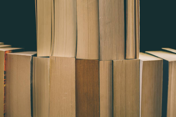 istock Books background. Old vintage books background. Education and knowledge, learn, study and wisdom concept. Stack of old books. Old books on a shelf, 884070326