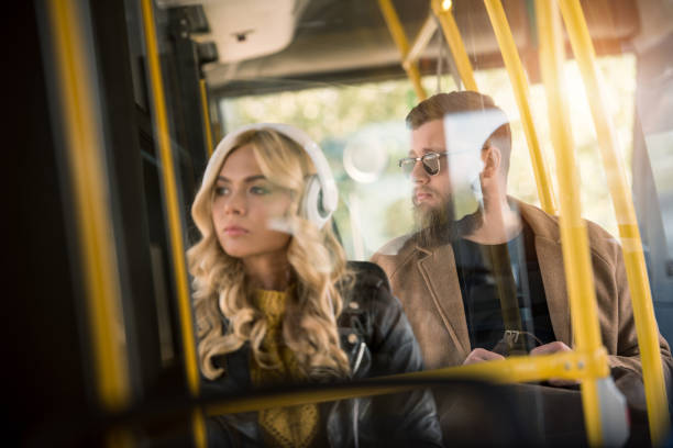 istock young couple in bus 884073134