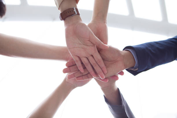 istock Teamwork people touch hands for unity group to succuss business. 884076966