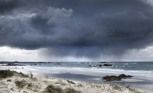 Fearsome giant storm cloud approaching coastline in Brittany, Farnce