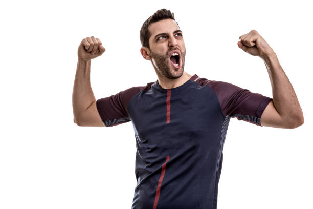 istock Soccer fan celebrating 884095406