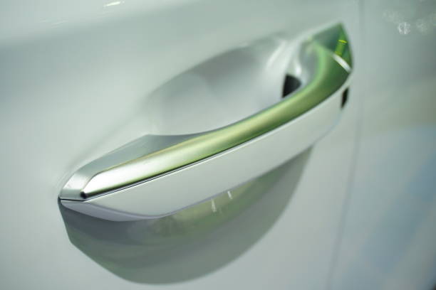 istock Black car doorhandle close up 884095538