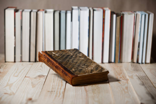 istock Textbooks and books on a wooden table 884095828