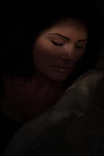 istock Woman is sleeping in the bed 884102322