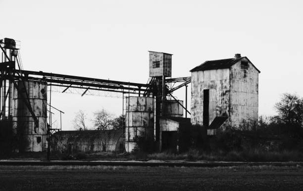 istock Rustic Ruin of Barn and Grain Silo (Black and White) 884102370