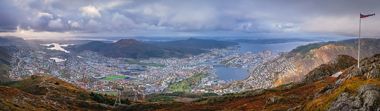 Panoramic view of Bergen town on a cloudy day as seen from the top of Mount Ulriken, Norway