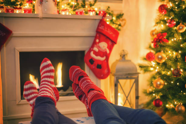 istock Warming and Relaxing Near Fireplace for The Christmas 884110504