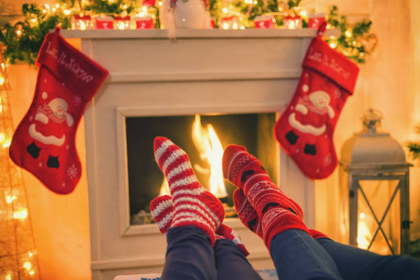 istock Warming and Relaxing Near Fireplace for The Christmas 884110512