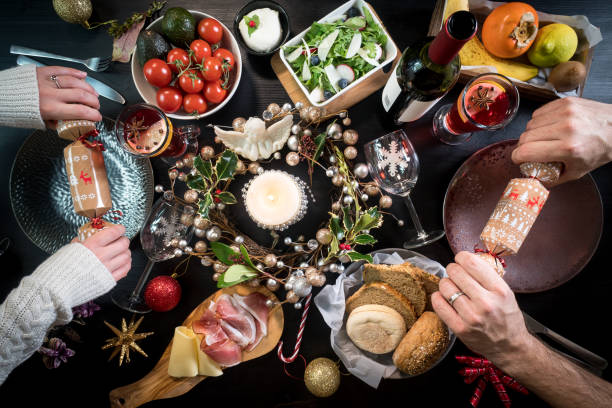 istock festive christmas thanksgiving dinner party food drinks hands 884116200
