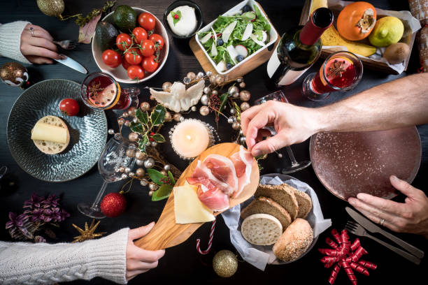 istock festive christmas thanksgiving dinner party food drinks hands 884116244