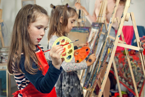 istock Children paint paint on canvas 884123054