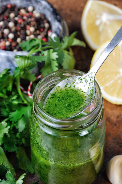 istock Green sauce, seasoning for salad 884131298