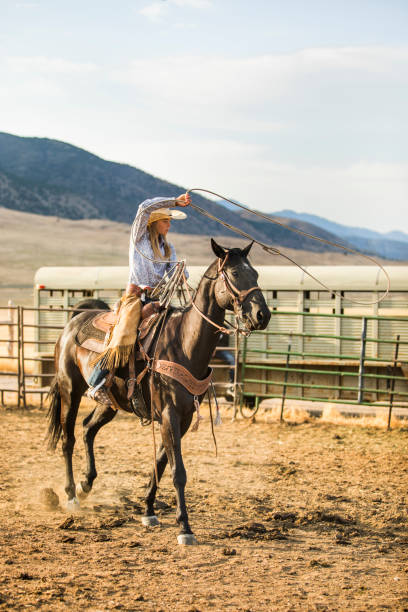 istock Cowgirl Riding on the Open Plain 884157392