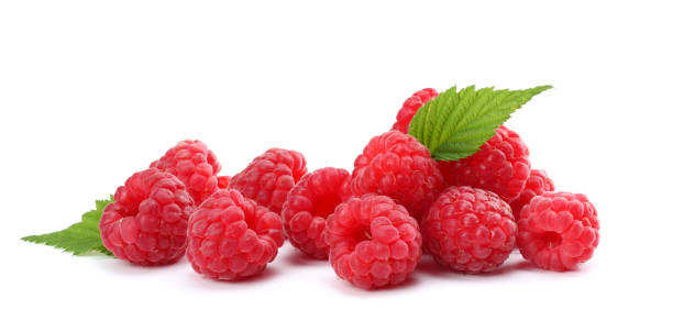 istock ripe raspberries with green leaf isolated on white background macro 884158102