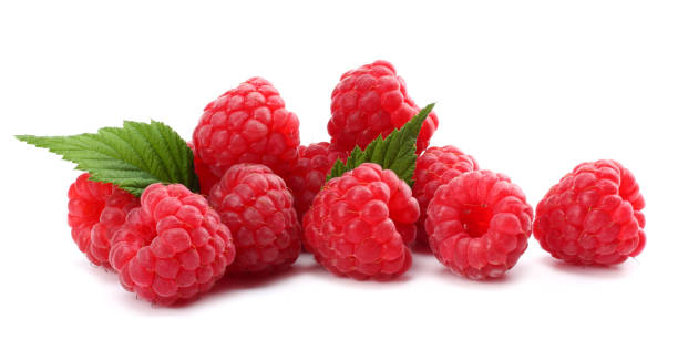istock ripe raspberries with green leaf isolated on white background macro 884158174