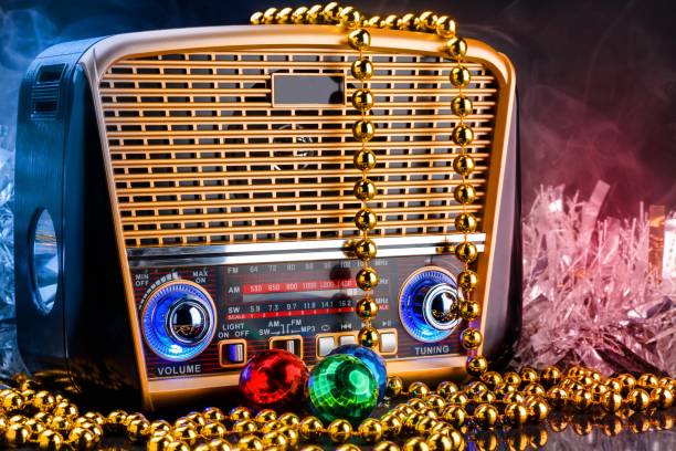 istock radio receiver in retro style with christmas decorations on black background 884178326