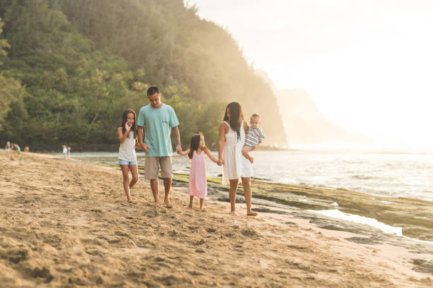 istock Hawaii family vacation on beach 884191370