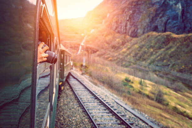Taking pictures of landscape from a train window