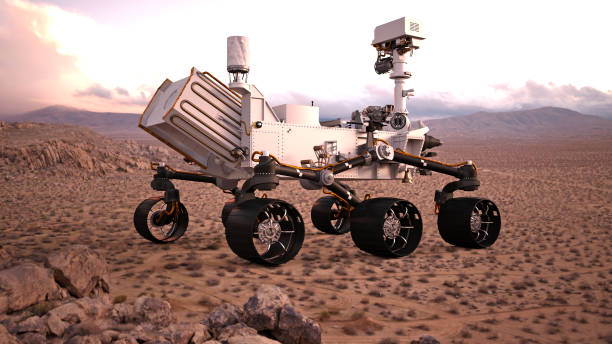 istock Mars Rover, robotic space autonomous vehicle on a deserted planet, rear view, 3D illustration 884220540