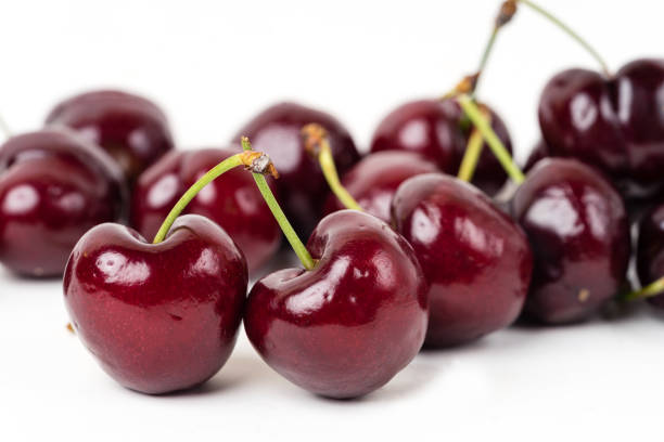 istock Cherry fruits on white background 884246106