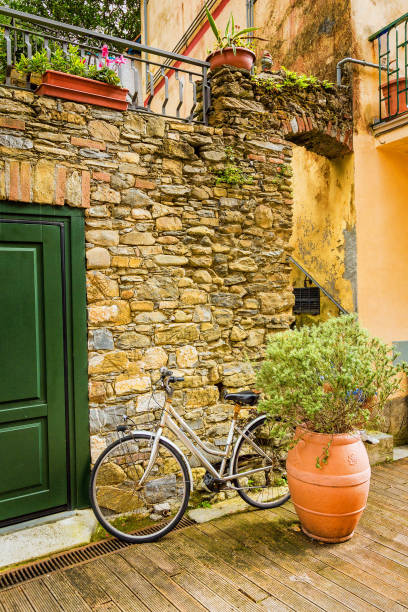 istock Bicycle in front of stone wall in Monterosso, Italy 884251110