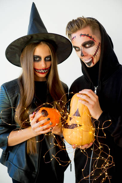 istock People in halloween costumes 884260268